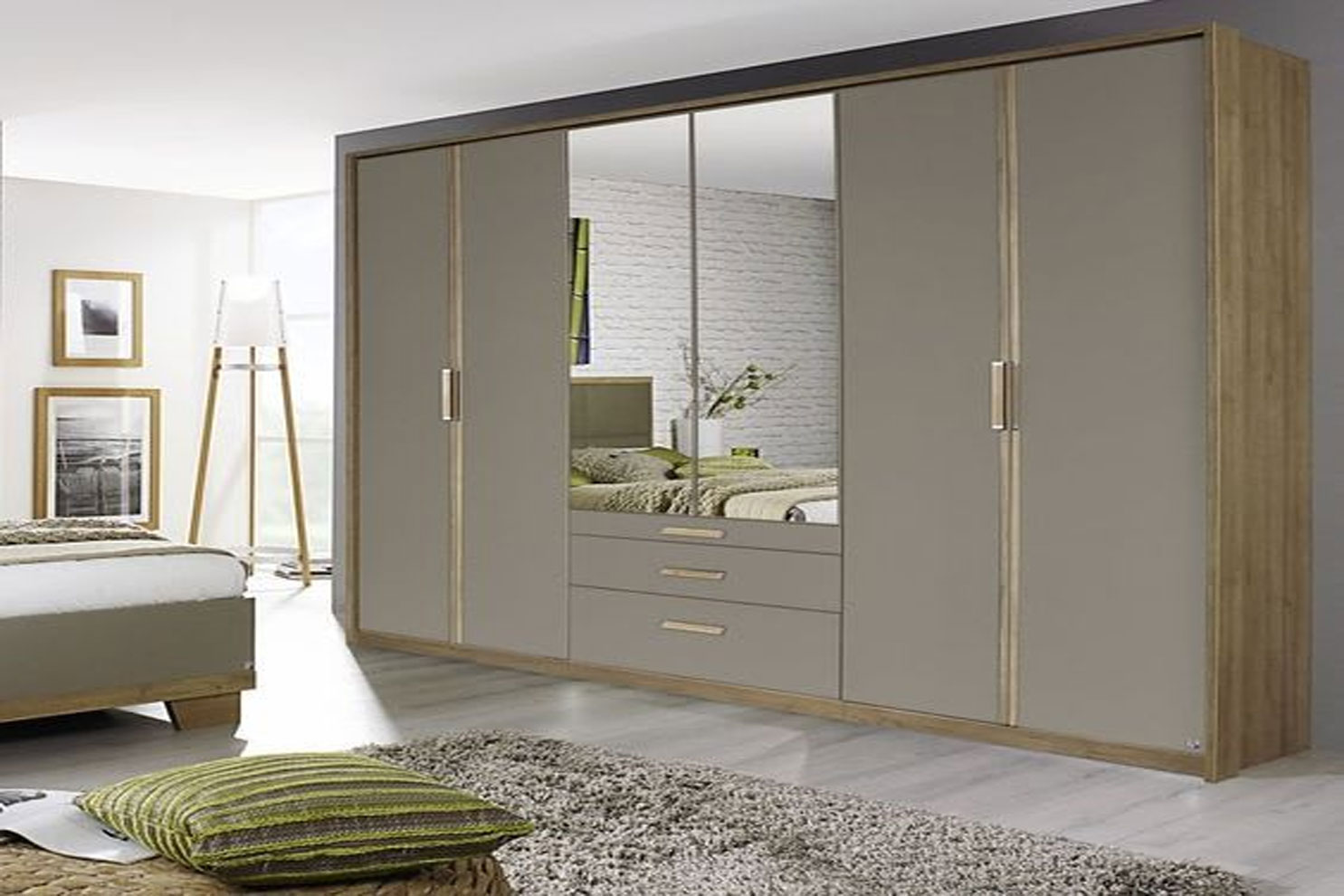 Elegant sliding door wardrobe design by Homzelite.